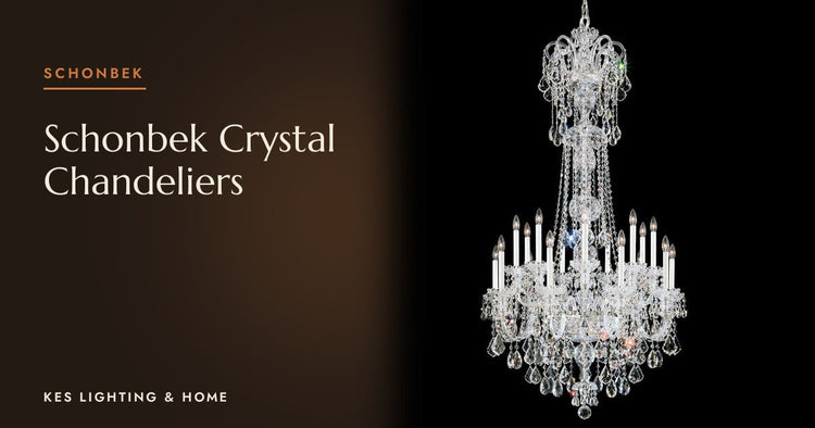 Tall chandelier with clear drops and candle bulbs on a black background