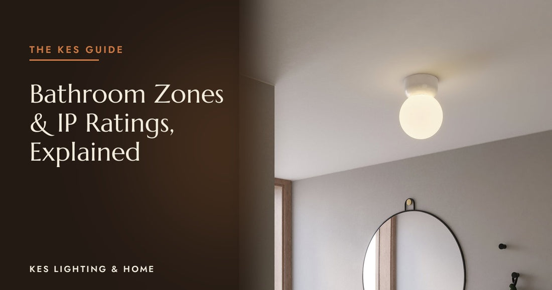 White globe ceiling light in a bathroom with a round mirror