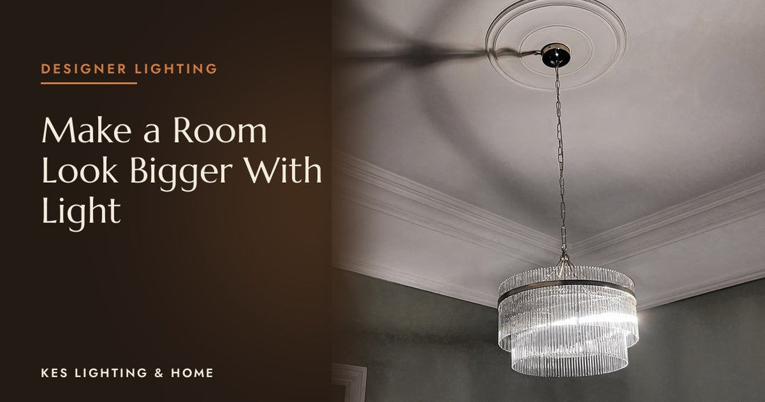 Silver-tone pendant with clear rods below an ornate ceiling rose
