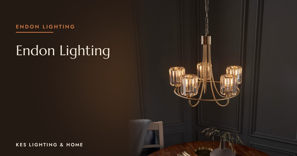 Gold-tone five-arm pendant with faceted clear shades above a dining table