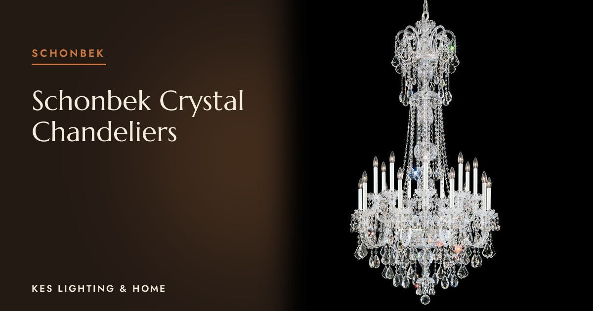 Tall chandelier with clear drops and candle bulbs on a black background