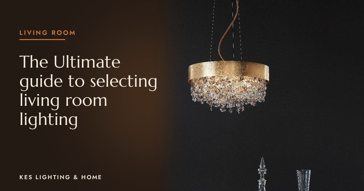 Gold-tone drum pendant with clear drops against a dark wall