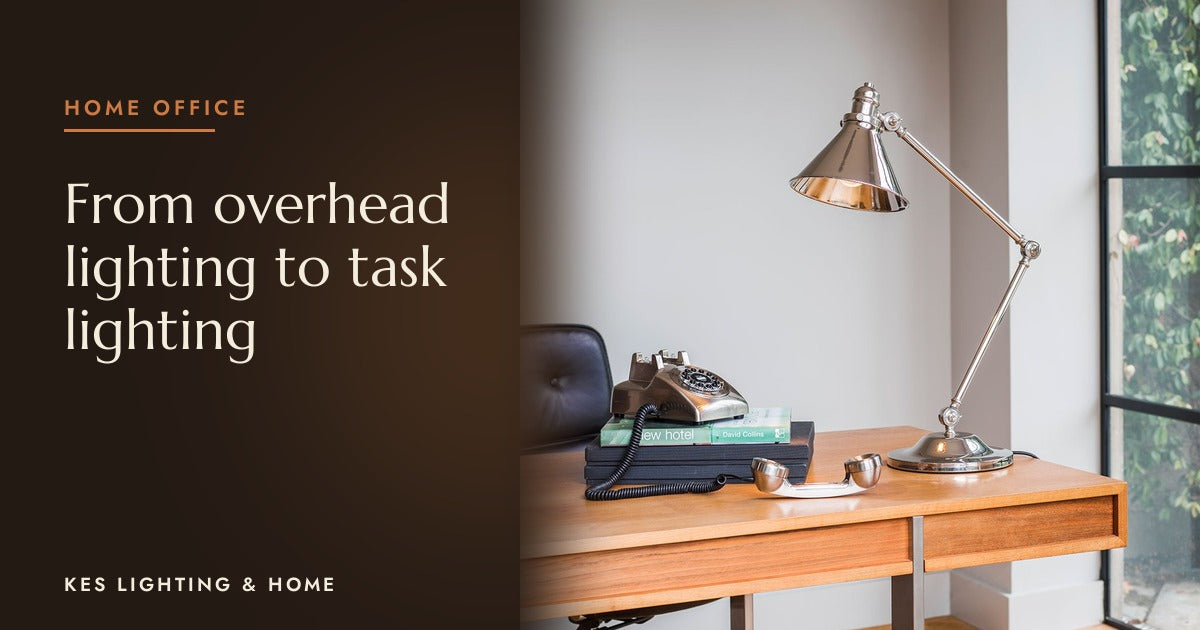 Silver-tone desk lamp on a wooden desk