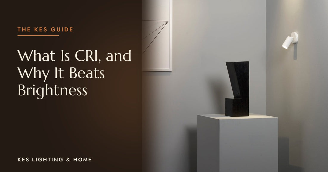 Adjustable spotlight lighting a sculpture on a plinth