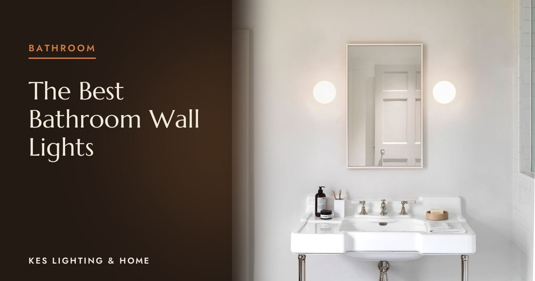 Pair of globe wall lights either side of a mirror above a basin