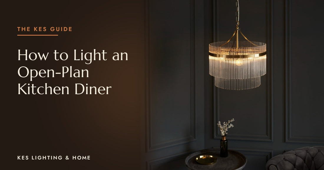Two-tier clear rod pendant with a gold-tone band against dark panelling