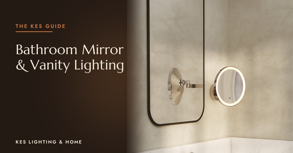 Illuminated round mirror beside a large wall mirror