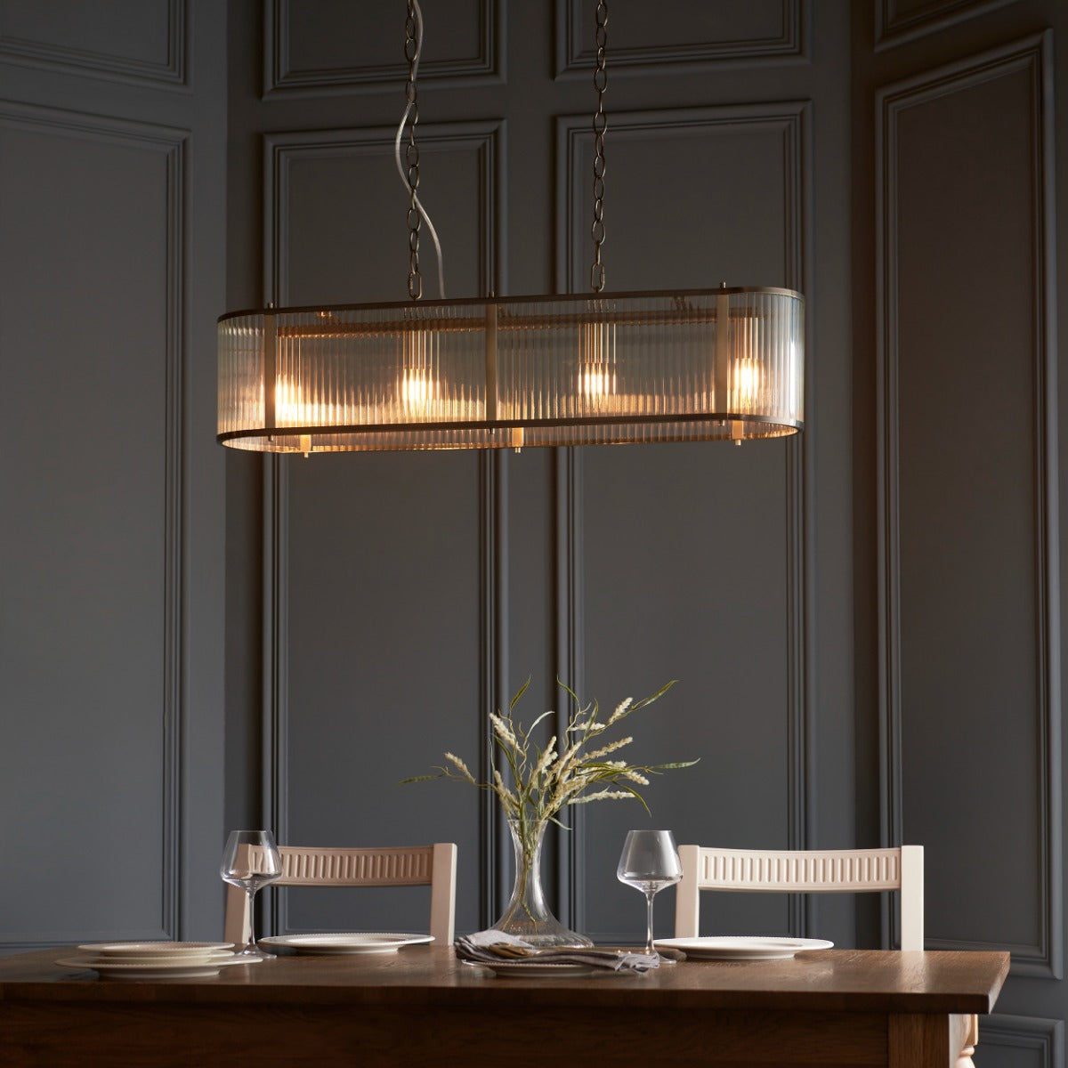 Endon Ridgeton 4 Light Linear Pendant in Antique Bras with Glass Shade
