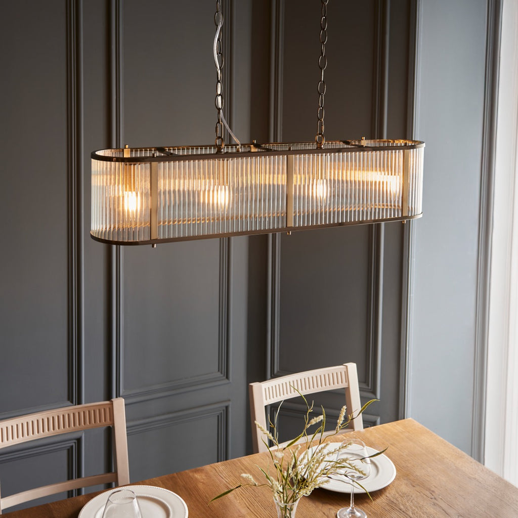 Endon Ridgeton 4 Light Linear Pendant in Antique Bras with Glass Shade
