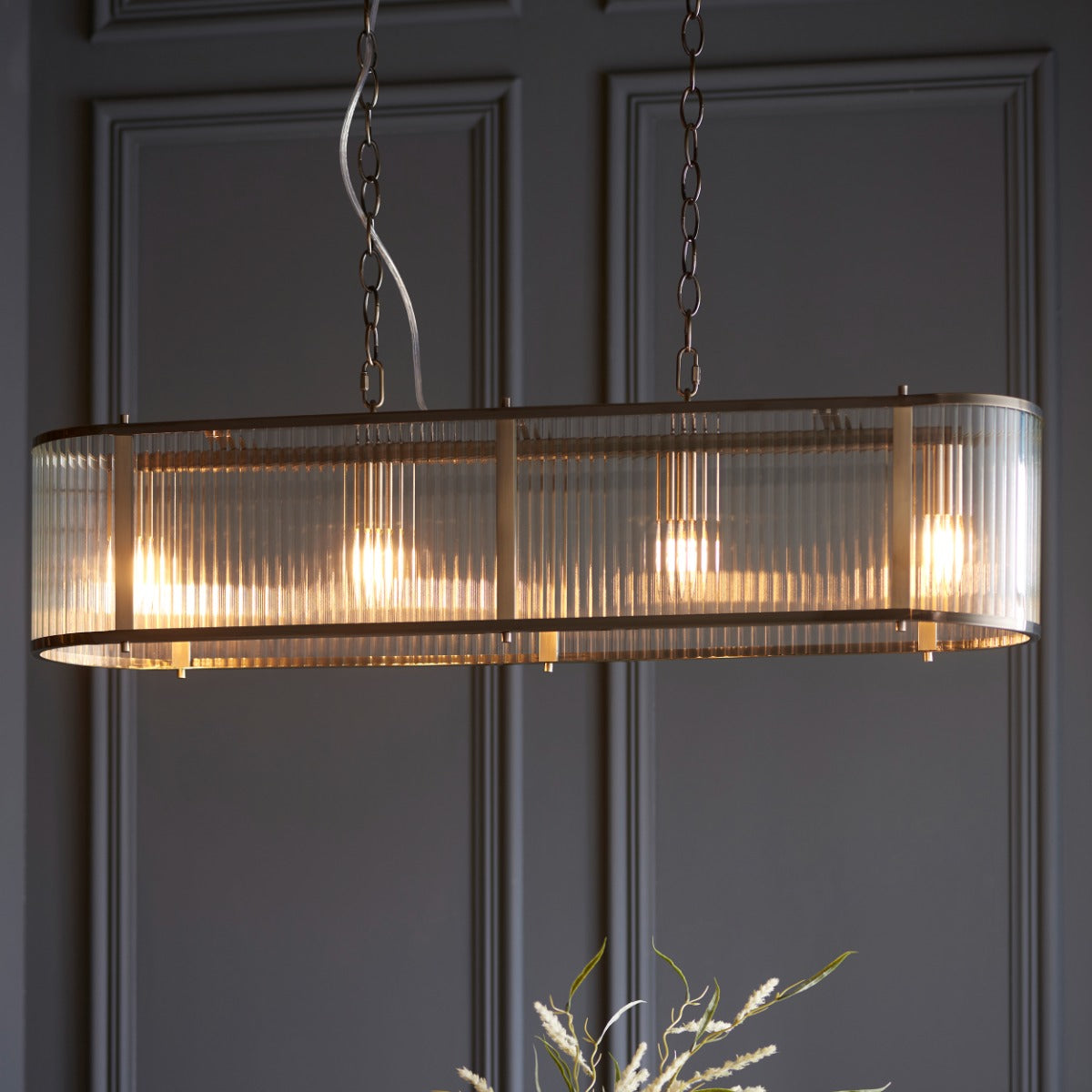 Endon Ridgeton 4 Light Linear Pendant in Antique Bras with Glass Shade