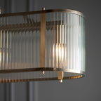 Endon Ridgeton 4 Light Linear Pendant in Antique Bras with Glass Shade