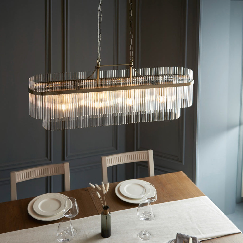 Marietta 4 Light Linear Pendant in Antique Brass with Clear Glass 