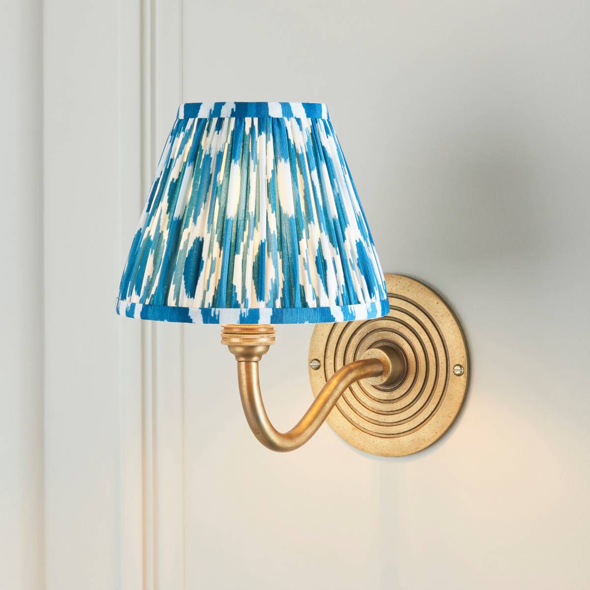 Endon Ripple Curve and Ikat 16cm Wall Light in Antique Brass and Marlin Blue Shade