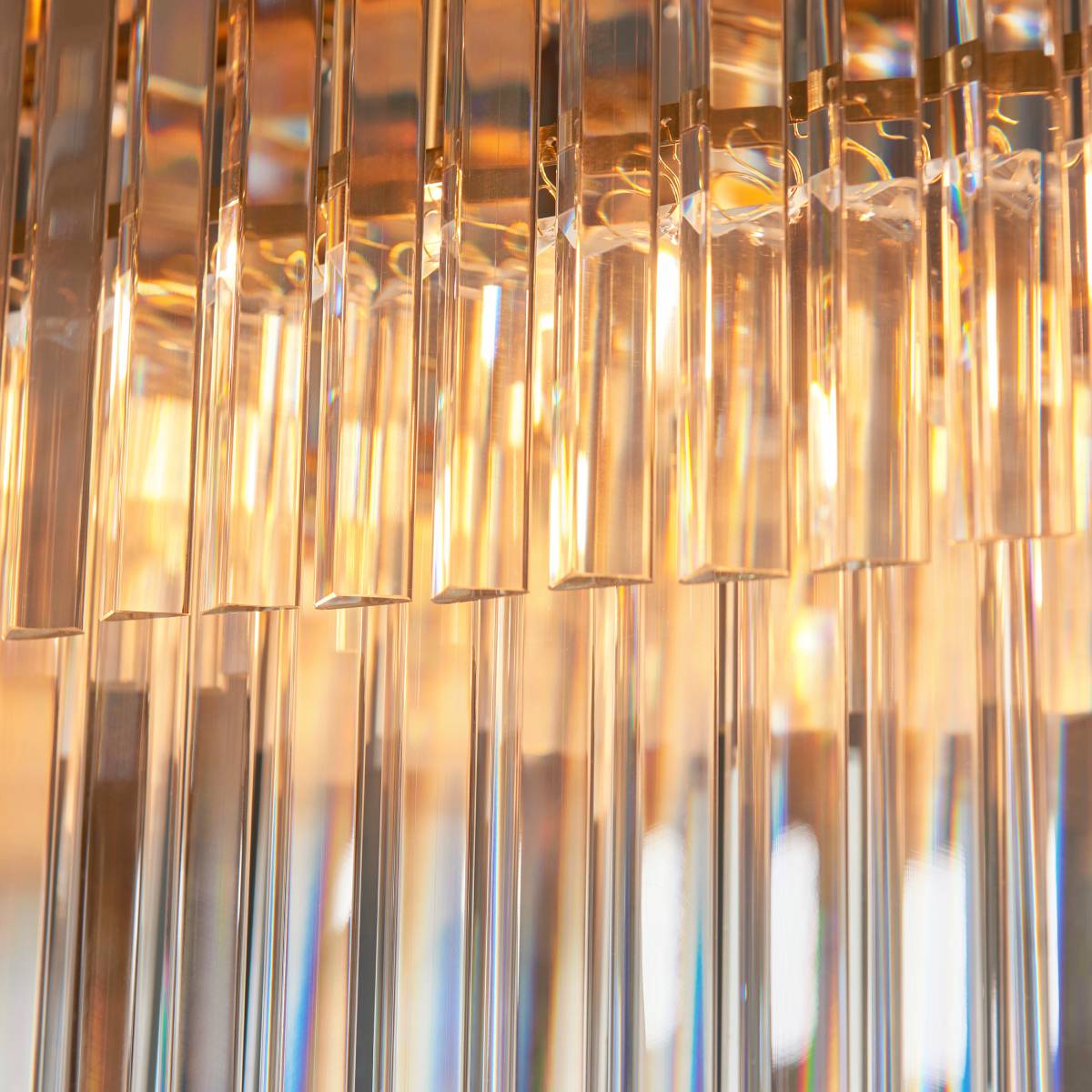 Endon Conaston 4 Light Linear Pendant in Brushed Aged Brass and Clear Cut Glass Shade