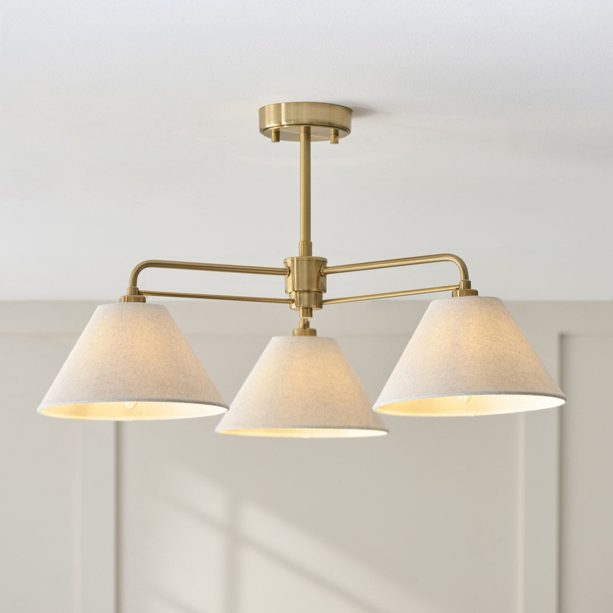 Endon Wallbridge 3 Light Semi Flush Ceiling Light in Brushed Aged Brass with Natural Linen Shades