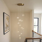 Endon Oslo 12 Light Cascade Pendant Light in Brushed Aged Brass with Clear Glass