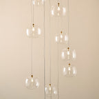 Endon Oslo 12 Light Cascade Pendant Light in Brushed Aged Brass with Clear Glass