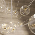 Endon Oslo 12 Light Cascade Pendant Light in Brushed Aged Brass with Clear Glass
