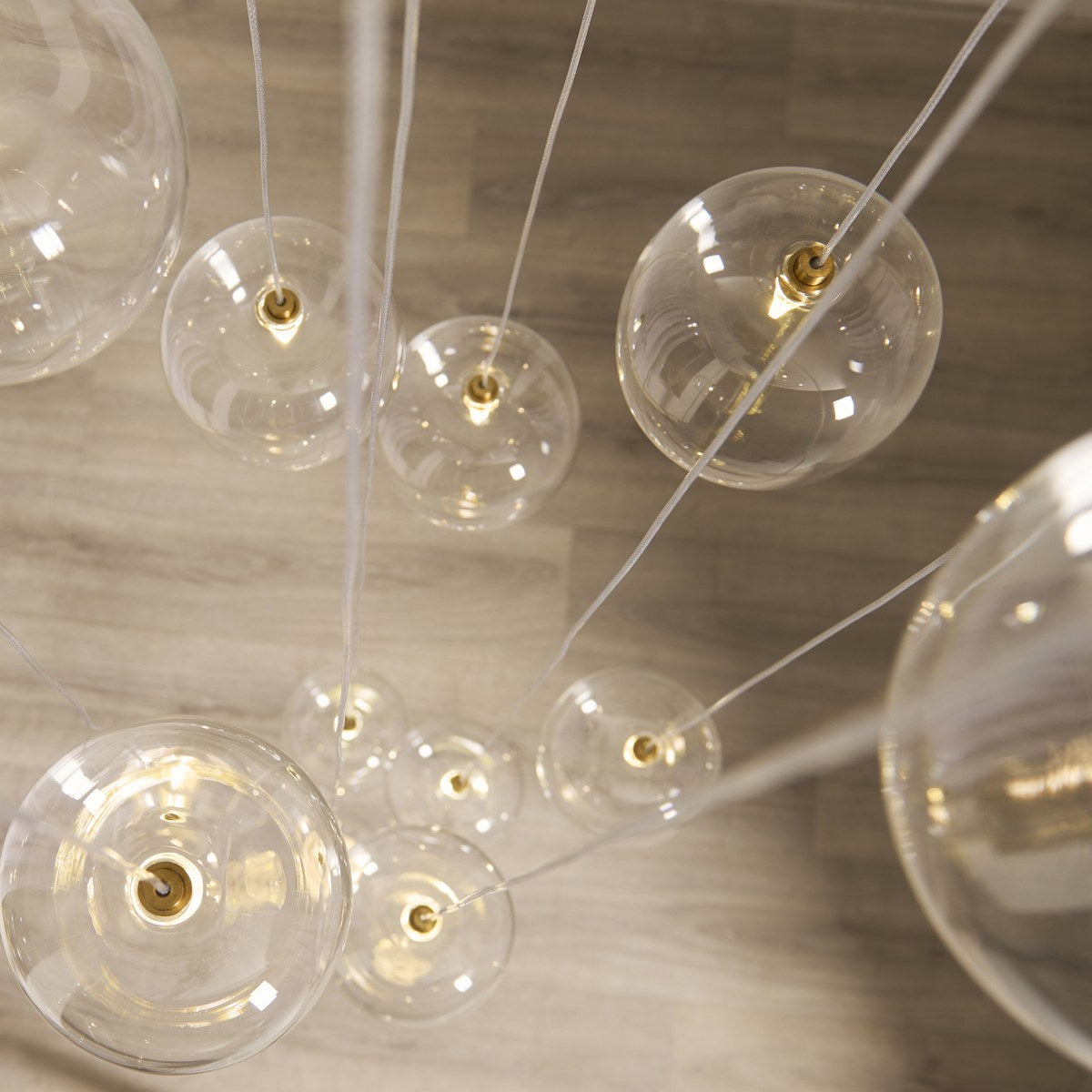 Endon Oslo 12 Light Cascade Pendant Light in Brushed Aged Brass with Clear Glass