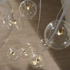 Endon Oslo 12 Light Cascade Pendant Light in Brushed Aged Brass with Clear Glass