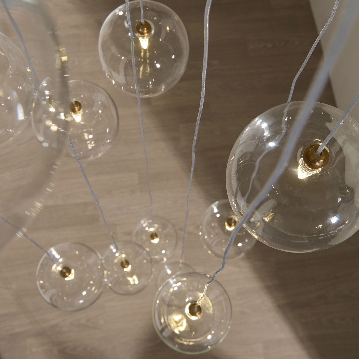 Endon Oslo 12 Light Cascade Pendant Light in Brushed Aged Brass with Clear Glass