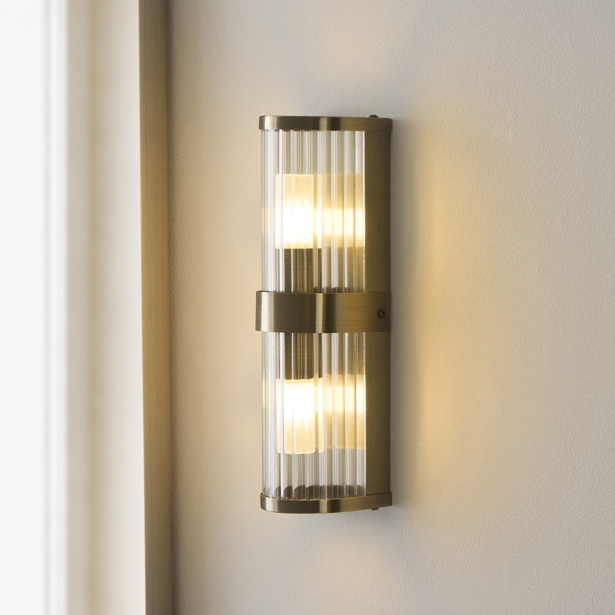 Endon Ridgeton IP44 2 Light Wall Light in Antique Brass with Clear Ribbed Glass