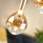 Schuller Essenza Single Pendant in Matt Black with Amber Glass Shade