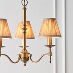 Interiors 1900 Stanford 3 Light Pendant Light in Antique Brass with Beige Shade