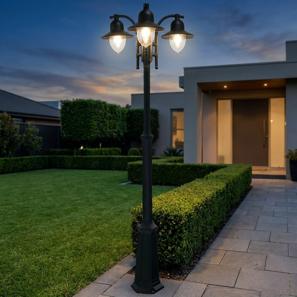 Norlys Como 3 Light Outdoor Post in Black - in a modern garden
