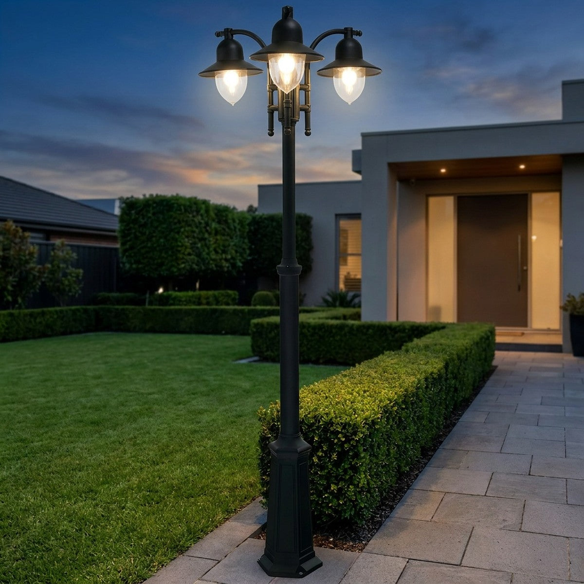 Norlys Como 3 Light Outdoor Post in Black - in a modern garden
