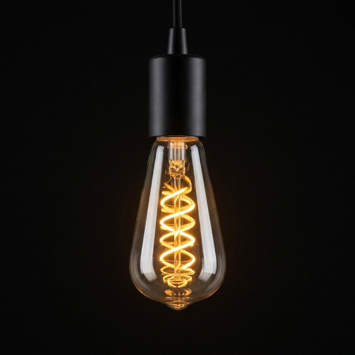 ST64 Vintage Spiral Filament LED Lamp 7W ES / E27 Cap Dimmable Extra Warm White 1800K - lit, showing the 1800K amber glow