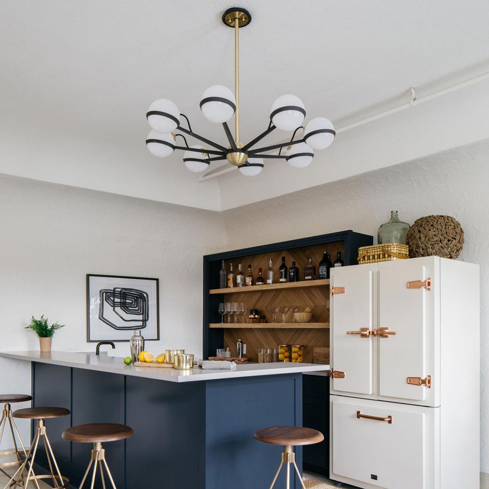 Troy Ace 8 Light Chandelier in Textured Bronze and Brushed Brass