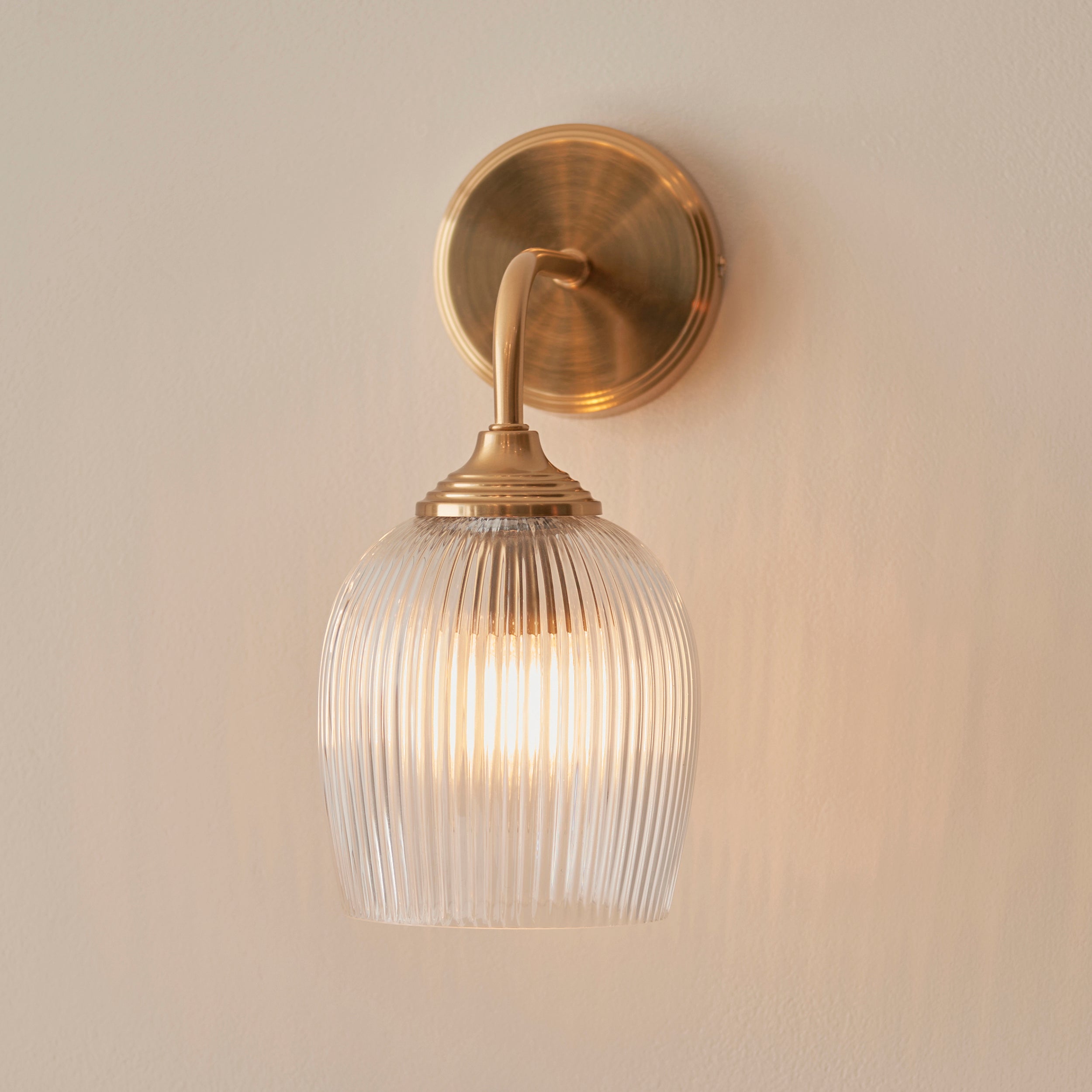 Endon Ashcroft Ribbed Wall Light in Brushed Aged Brass and Clear Ribbed Glass