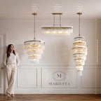 Marietta 16 light, 4 light linear and Grand 21 light shown to scale beside a person, against a standard 2.4m ceiling height