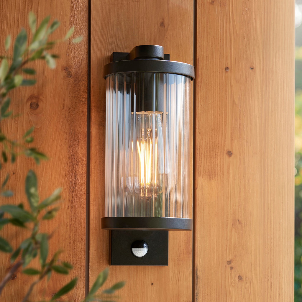Endon Newcombe Outdoor Wall Light in Matt Black and Clear Ribbed Glass