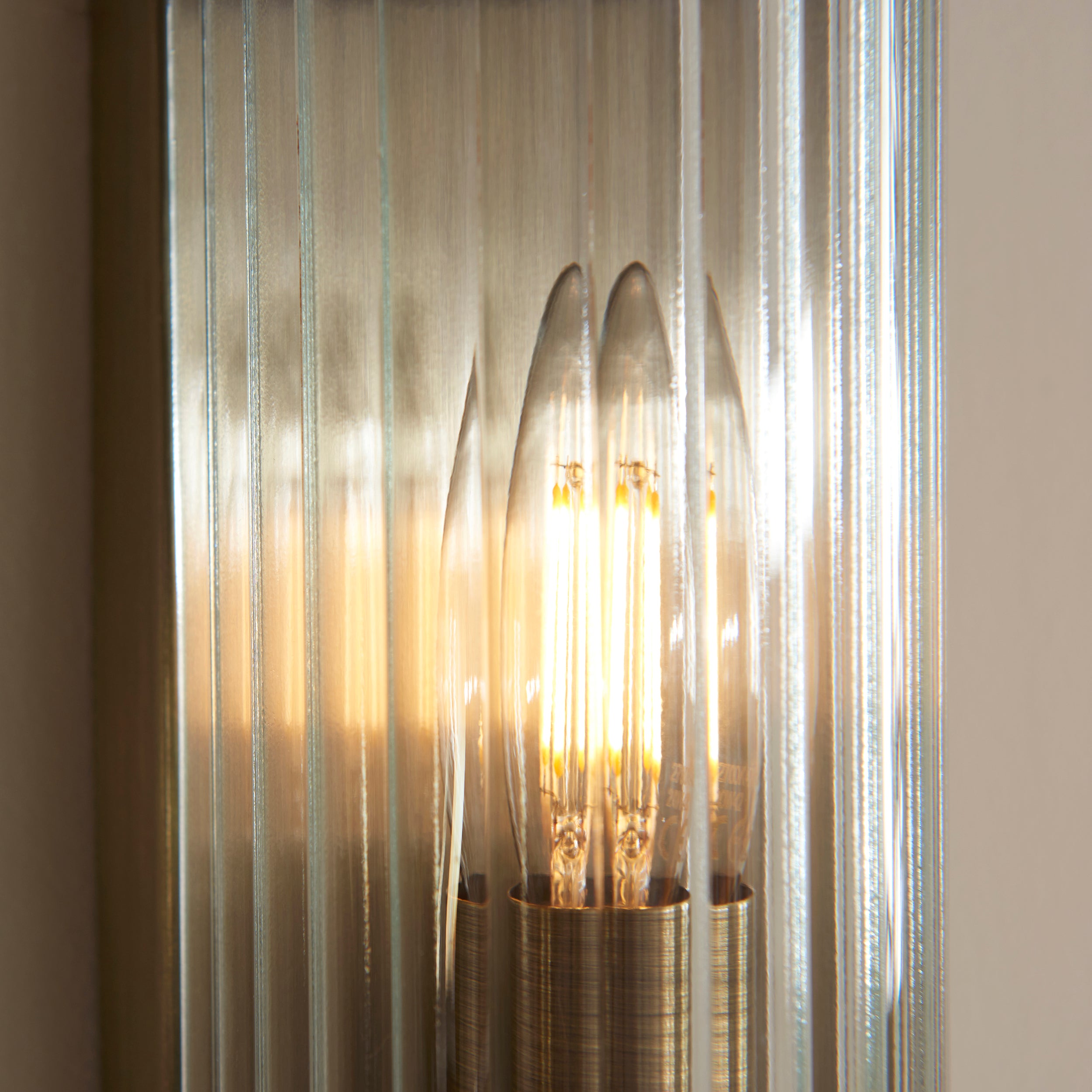 Endon Ridgeton Wall Light in Antique Brass and Clear Ribbed Glass Shade