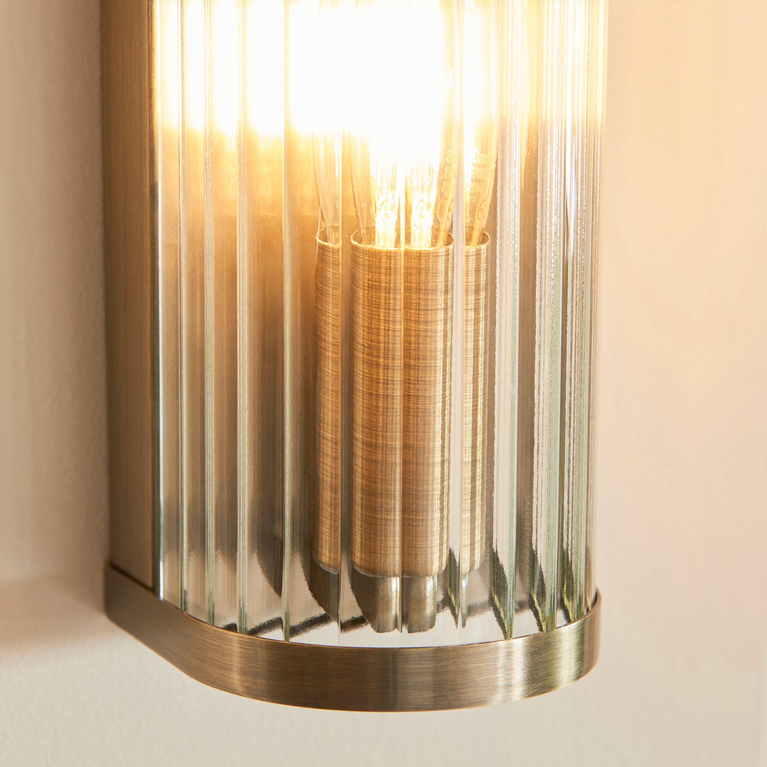Endon Ridgeton Wall Light in Antique Brass and Clear Ribbed Glass Shade