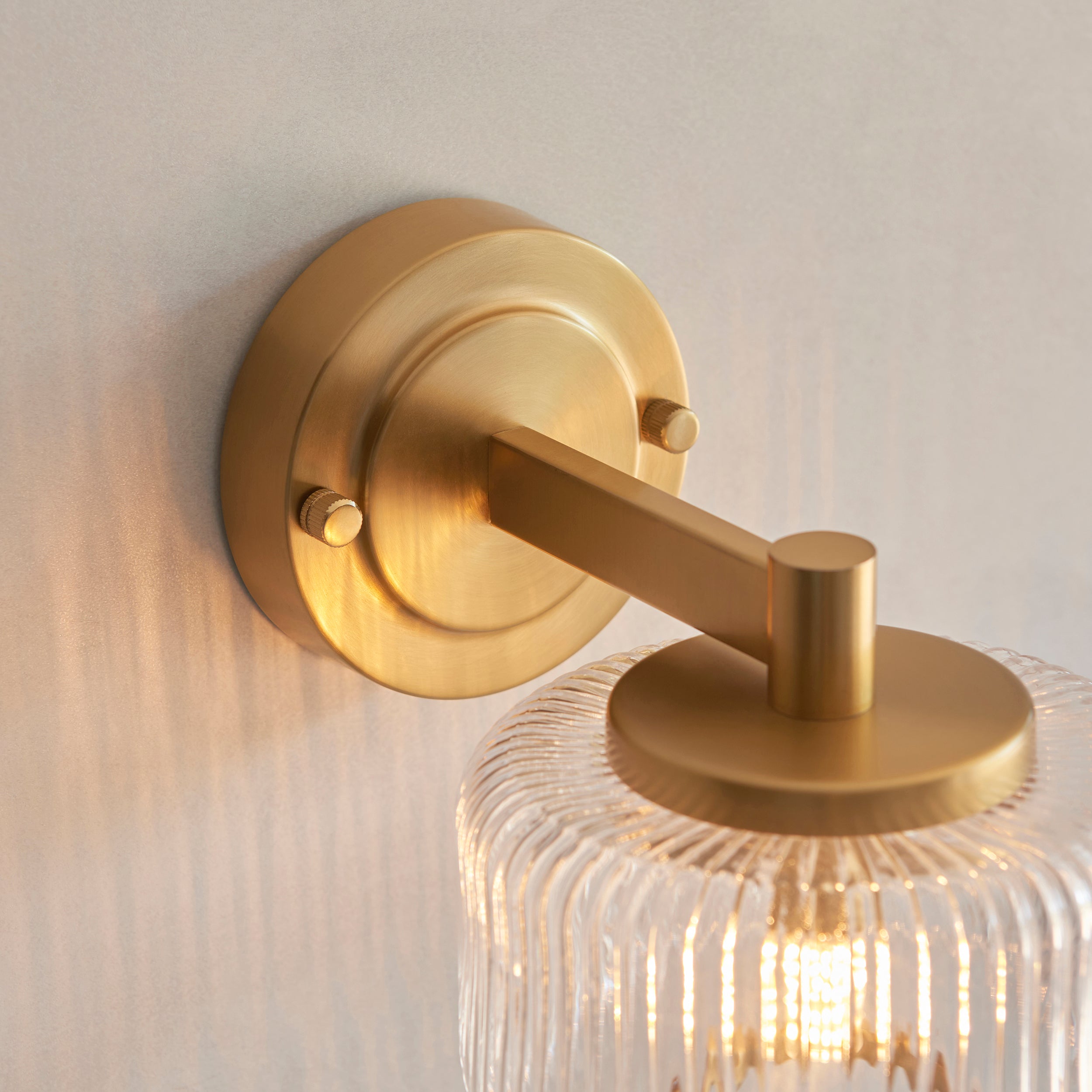 Endon Stamford Wall Light in Brushed Aged Brass and Clear Ribbed Glass