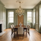 Feiss Valentina 6 Light Chandelier in Oxidised Bronze lit over a mahogany dining table in a sage green panelled Georgian dining room