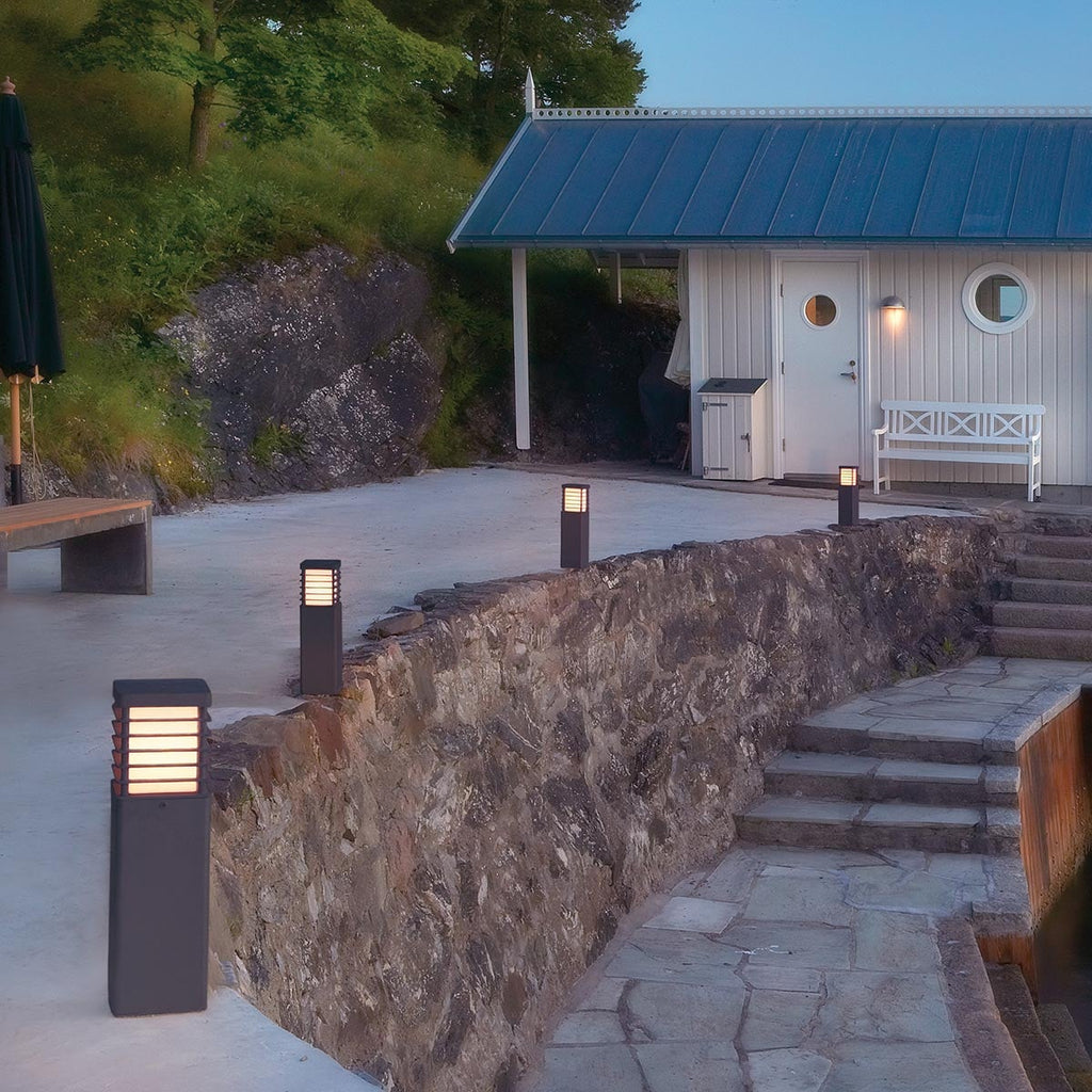 Norlys Halmstad Medium Outdoor Bollard in Black, in situ