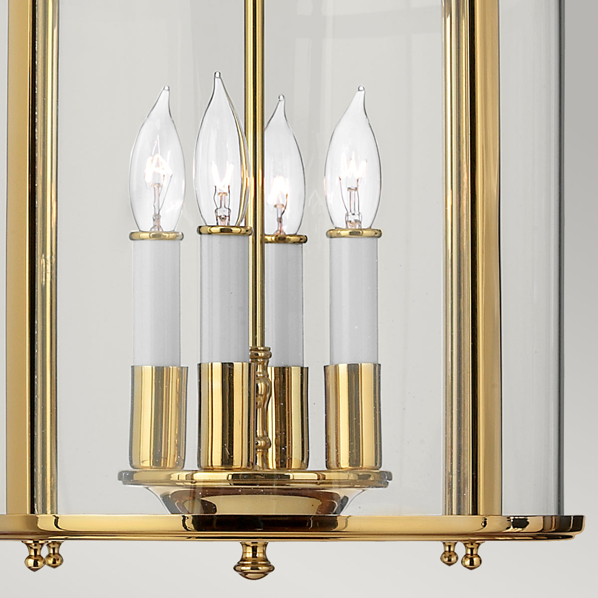 Hinkley Gentry Medium 4 Light Pendant Light in Polished Brass