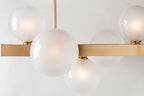 Hudson Valley Hinsdale 7 Light Island Pendant Light in Aged Brass