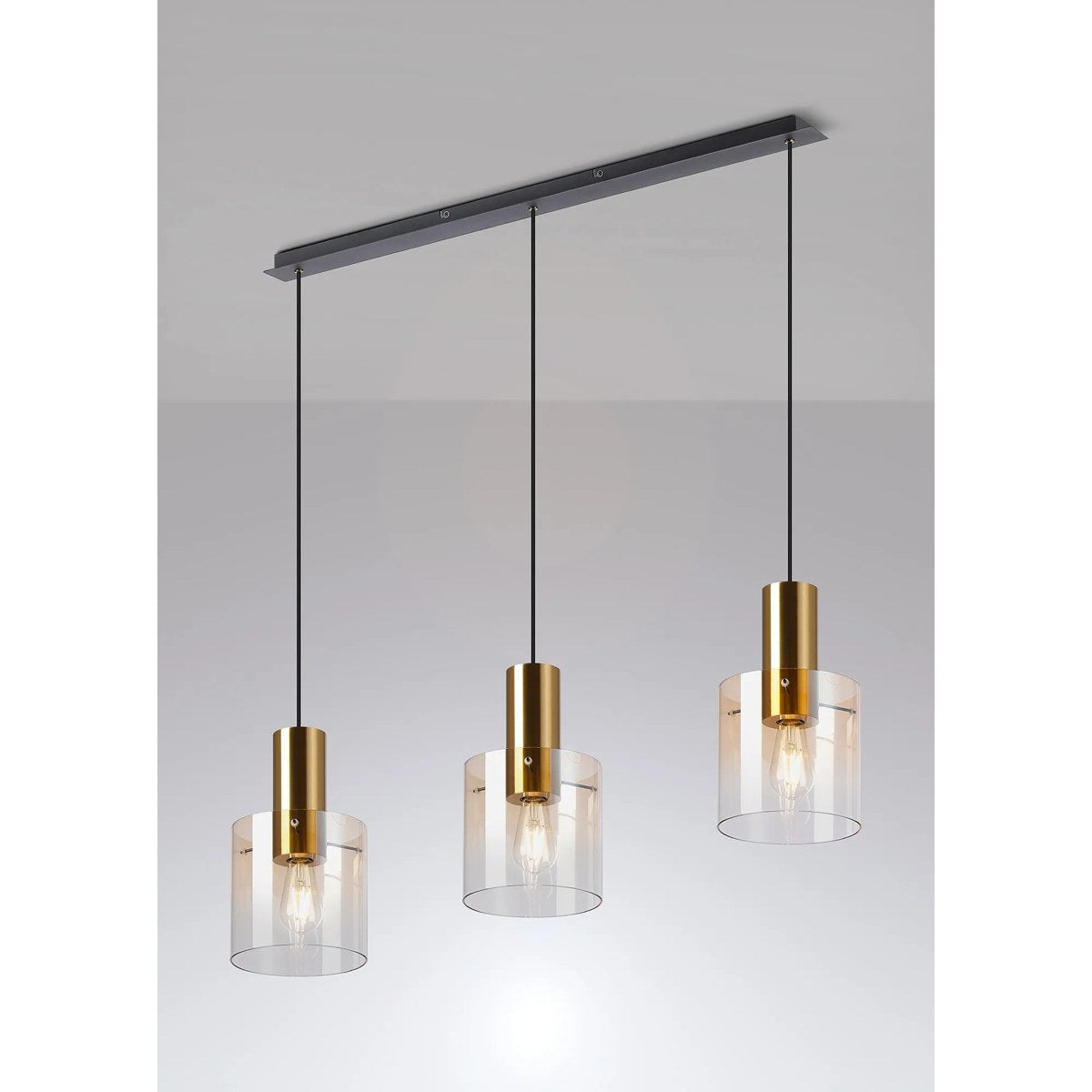 Regent Maisy 3 Light 1000mm Linear Pendant Light - Brass / Sand Black / Amber Fade