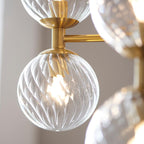 Novena Andarela12 Light Pendant Brushed Aged Brass with Twisted Clear Glass