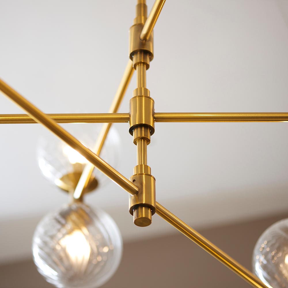 Novena Andarela12 Light Pendant Brushed Aged Brass with Twisted Clear Glass