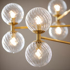 Novena Andarela12 Light Pendant Brushed Aged Brass with Twisted Clear Glass
