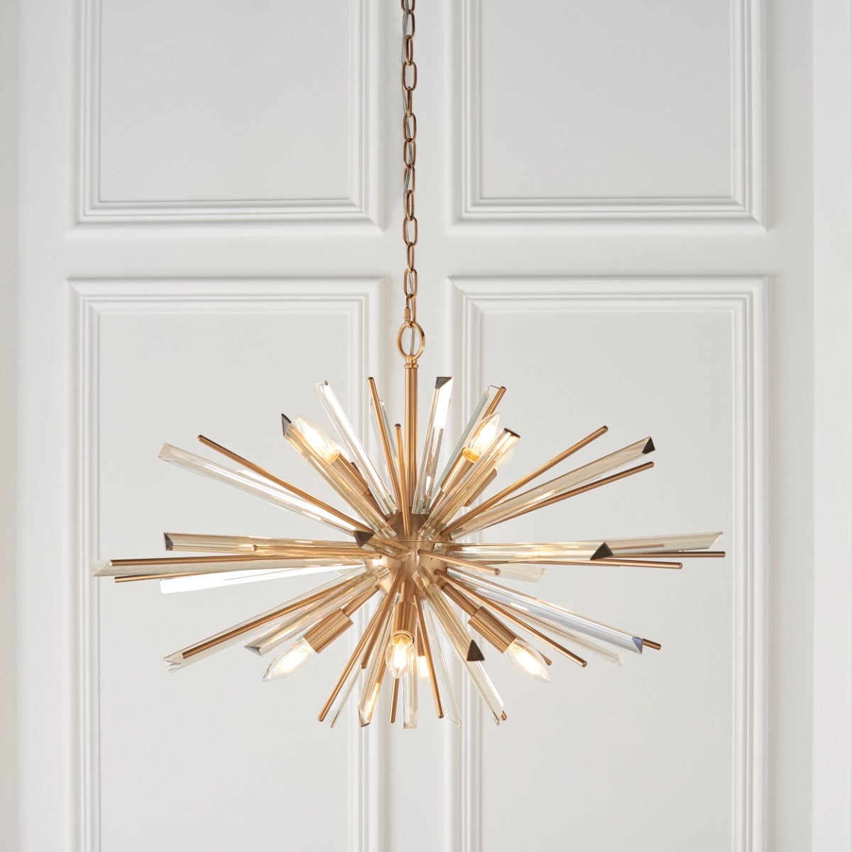 Novena Arroyo 8 Light Pendant Light Antique Brass Plate with Champagne Glass