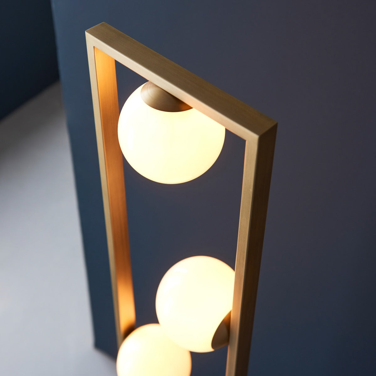Novena Bromos 3 Light Floor Lamp Brushed Gold Gloss Opal Glass