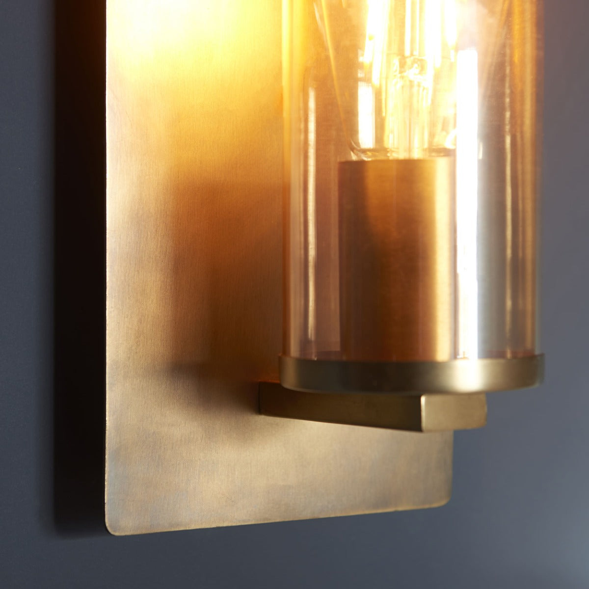 Novena Caroli 1 Light Wall Light Antique Brass Clear Glass
