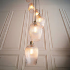 Novena Lavaur 13 Light Cascade Pendant in Antique Brass with Clear Ribbed Glass Shades